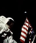 640px-Apollo_17_Astronaut_Cernan_Adjusts_U.S._Flag_on_Lunar_Surface_(5052744448)